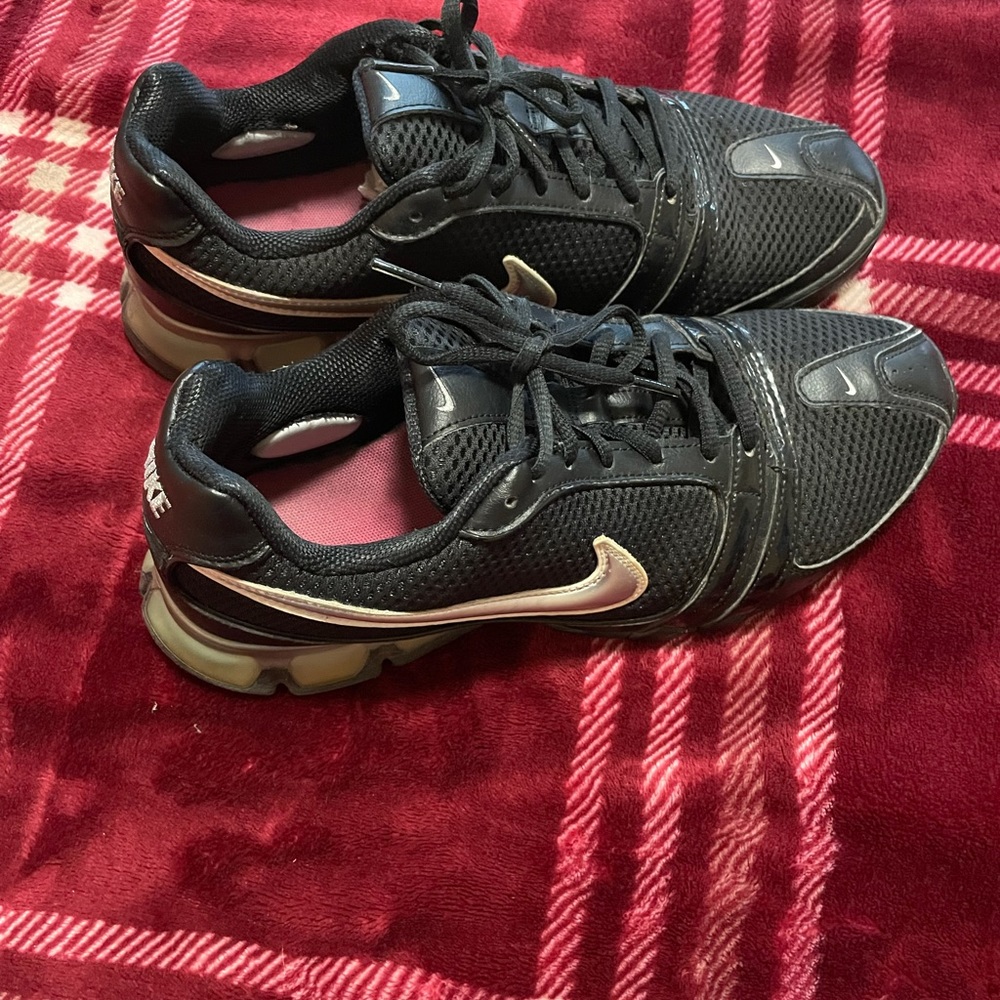 Nike WMNS Air Strike Turf Sneakers.